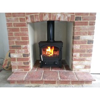 brick fireplace and red pamments