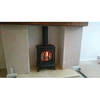 Gazco Huntingdon 20 with tracery door gas stove with log effect and conventional flue