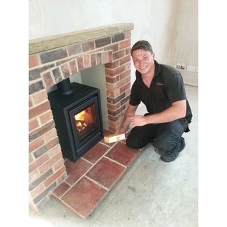 Stovax stove in a brick fireplace
