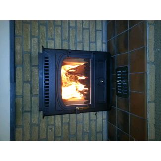 Clearview Vision inset 5kw multi fuel stove fitted into an existing fireplace