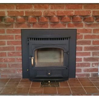 Clearview Vision inset with 4 inch frame 5kw multifuel stove in black with brass fittings