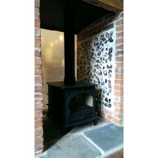 Double sided Parkray Consort 15 multifuel stove and brick / flint fireplace we built