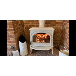 Jotul F400 with clear door 7kw woodburner in ivory enamel on live display