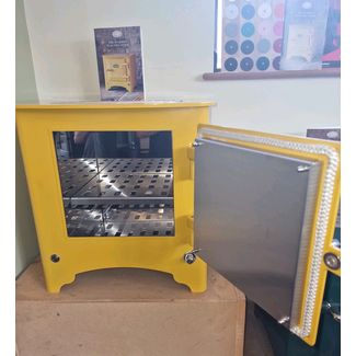Everhot electric stove in mustard yellow with oven open