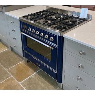 ILVE Majestic 90cm dual fuel range cooker in blue with chrome knobs and trims