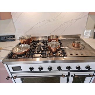Hammered Copper Pans on the ILVE Majestic range cooker