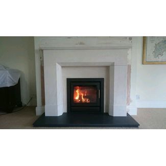 Stovax Riva 50 inset woodburning stove in a Limestone fireplace we installed