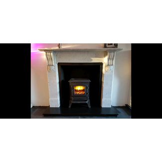 Broseley York clear door cast iron electric stove and marble mantel