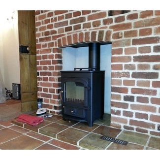 Clearview Pioneer 400 on 2 legs with rear outlet in a brick fireplace