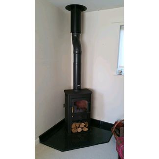 Clearview Solution 400 on a black polished granite corner hearth