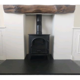 Stovax Stockton 5 stove 5kw with a burnt oak effect vintage beam from Focus Fireplaces & riven slate hearth