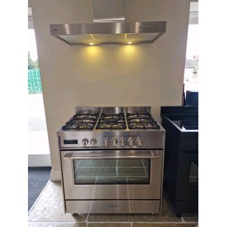 Delonghi 90cm space range cooker in stainless steel with matching stainless steel slab extractor hood 