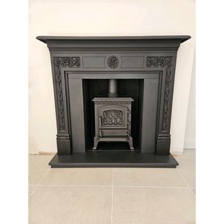 Stovax Victorian cast Iron Mantel, Cast Iron reeded panels inside with a honed granite hearth and slips. The electric Stove is a Broseley York
